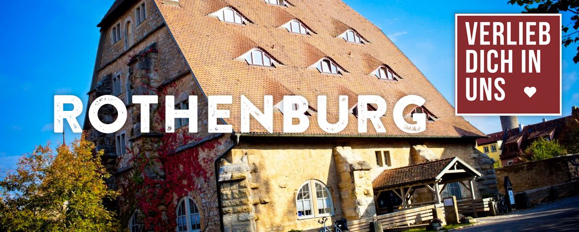 Außenansicht der Jugendherberge Rothenburg. Dem Bild überlagert sind die Texte "Verlieb dich in uns" sowie "Rothenburg".