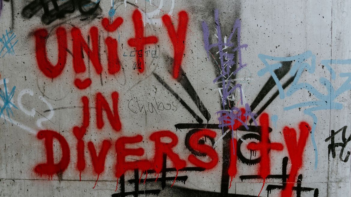 Ein Graffiti mit den Worten Unity in Diversity