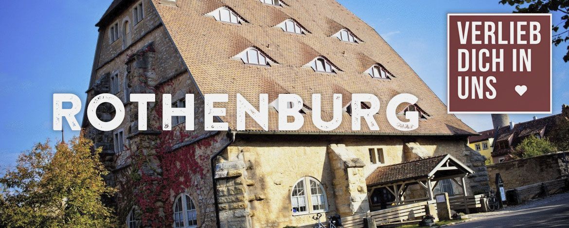 Außenansicht der Jugendherberge Rothenburg. Dem Bild überlagert sind die Texte "Verlieb dich in uns" sowie "Rothenburg".